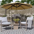 Outdoor Sofa Set With Cushions Umbrella Side Table And Plants In Natural Setting