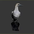 White Seabird with Blue Beak and Black Wing Feathers on Dark Base Stand