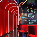 Modern Restaurant Interior With Bar Counter Red Bar Stools And Wine Bottle Shelves