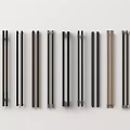 Various Metal Cabinet Handles In Different Colors Arranged On White Background