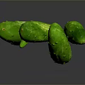 Fresh Green Cucumbers With Sliced Pieces On Dark Background