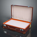 Open Brown Leather Suitcase With White Interior Orange Trim And Metal Locks