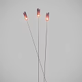 Three Slim Floor Lamps With Red Lampshades Lit In Grey Background