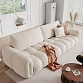 Beige Two-seater Sofa in Modern Living Room with Brown Blanket Checkered Pillows and Floor Lamp