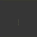 Green Military Tank in Outdoor Environment with Trees and Gray Reflective Ground