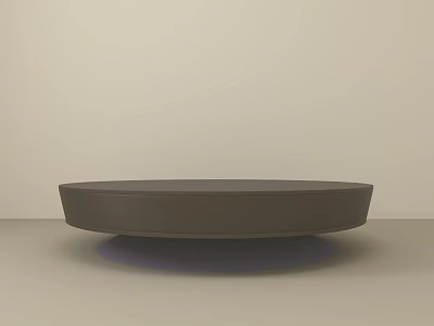 Modern Circular Coffee Table With Smooth Dark Surface In Minimalist Room 3d model