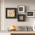 Stylish Photo Wall Design With Black Framed Artworks And Decorative Elements On Beige Background