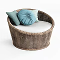 Round Woven Rattan Outdoor Sofa With White Cushion And Blue Light Green Pillows