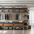 Modern Walk-in Closet Interior With Open Storage Hanging Area And Drawer Systems