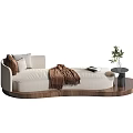 Elegant Cream Fabric Chaise Lounge With Plush Pillows Cozy Throw Blanket And Wooden Side Table