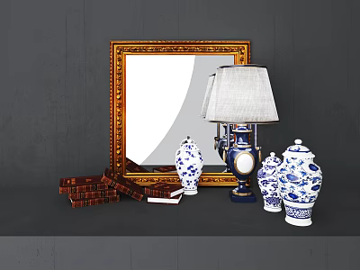 Decorative Ornament Set With Golden Framed Mirror Table Lamp Blue White Vases And Stacked Books 3d model