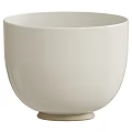 Modern White Bowl Shaped Bathtub With Sleek Ceramic Surface And Minimalist Base Design