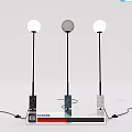 Three Modern Floor Lamps With Textured Black Blue Gray Bases And Round White Shades