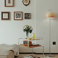 Stylish Side Table with Wooden Shelf Silver Frame and White Flower Vase Near Floor Lamp