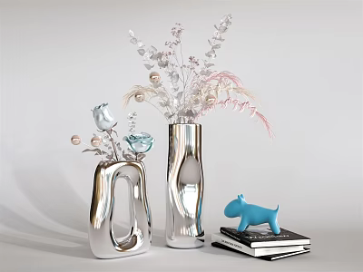 Silver Vases With White Pink Flowers And Decorative Beads Blue Dog Figurine On Books 3d model