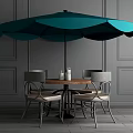 Outdoor Table with Colorful Umbrella and Modern Chairs for Patio Use