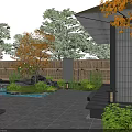 Serene Japanese Garden Courtyard Featuring Bamboo Fence Maple Trees Rocks Waterfall And Stone Patio
