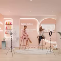 Fashion Cooking Themed Live Stream Studio With Pink Decor Two Hosts And Ring Lights