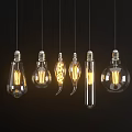 Vintage Filament Light Bulbs Hanging With Different Shapes And Warm Glow
