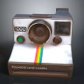 Vintage Polaroid Land Digital Instant Camera With Rainbow Stripe And Classic Lens Design