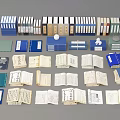 Diverse Open Books and Stacked Magazines Featuring Colored Covers and Various Sizes