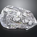Natural Rock Surface With Crushed Stones Small Green Plants And Rough Texture