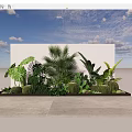 Lush Tropical Plant Combination with Cacti and Large Leaves Against White Brick Wall