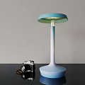 Modern Blue White Gradient Table Lamp with Round Lampshade and Vintage Camera on Black Table