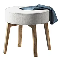 Modern Round Upholstered Stool With Light Gray Seat Wooden Legs And Blue Cloth