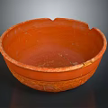 Artisanal Carved Terracotta Bowl With Intricate Surface Patterns And Smooth Interior