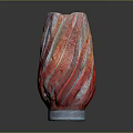 Colorful Glass Vase With Red Orange Blue Stripes And Glossy Surface On Dark Background