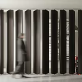Modern Black Slatted Partition In Lobby Interior Space With Walking People