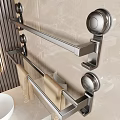 Beige Towels On Stainless Steel Towel Rack In Modern Bathroom With Marble Wall