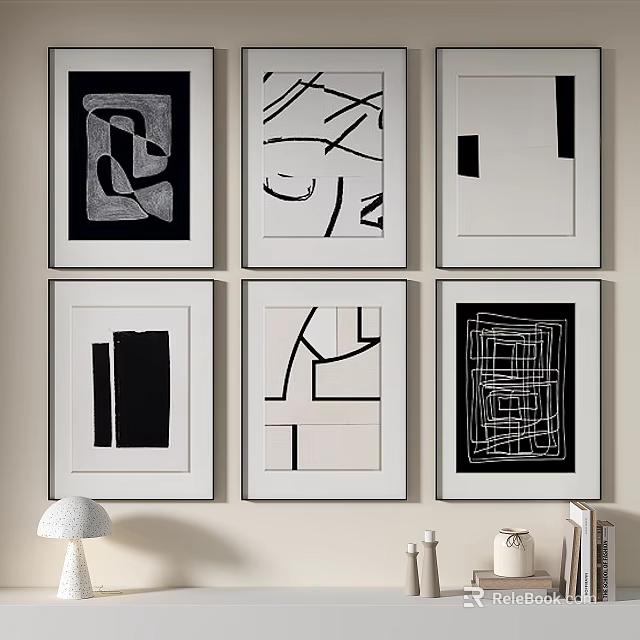 Black And White Abstract Artworks Framed On Wall With Decorative Elements 3d model