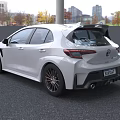 White Toyota Sporty Car With Aggressive Front End And Aerodynamic Features
