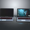 Two Silver Laptops Featuring Black Screen And Gaming Display With Person