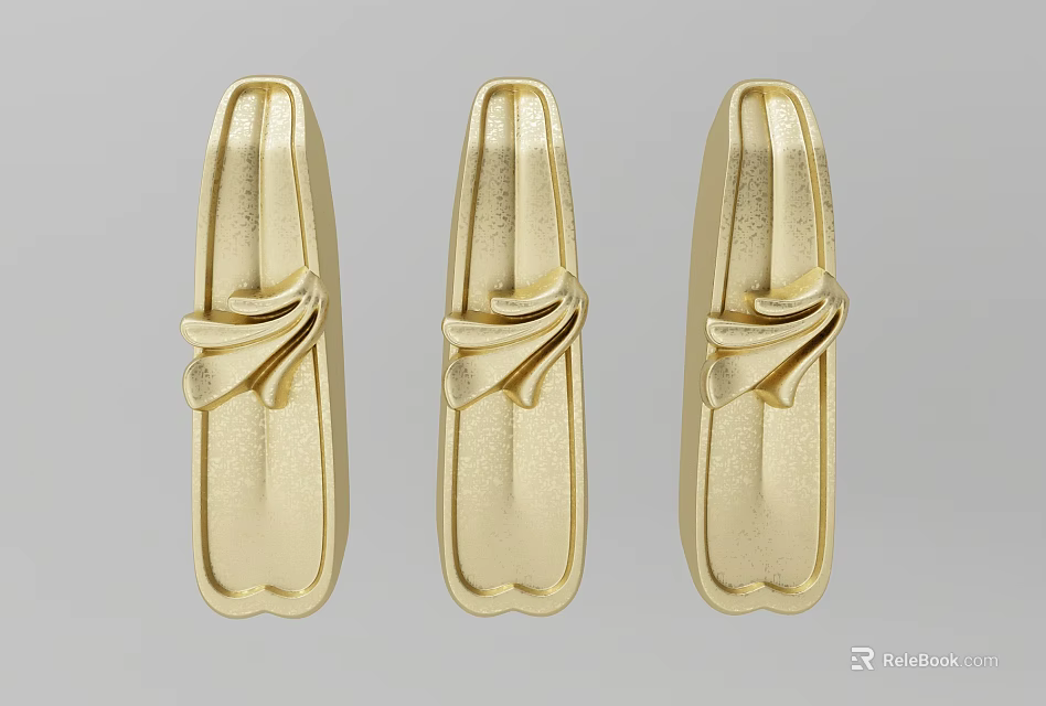 Three Gold Carved Decorative Ornaments With Intricate Patterns And Fine Craftsmanship 3d model 