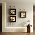 Wavy Pattern Abstract Paintings With Brown Yellow Hues Black Frames On Wall Warm Lighting 3d model
