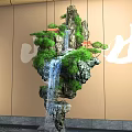 Hotel Lobby Bar With Hanging Rockery Waterfall Green Plants Mountain Water Characters And Beige Walls