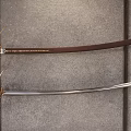 Vintage Decorative Sword With Golden Ornate Hilt Dark Blue Wrapped Handle And Wooden Scabbard