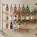 Decorative Metal Wall Shelf With Multiple Tiers Holding Various Wine Bottles And Glasses
