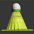 Yellow Badminton Shuttlecock Equipment With White Green Cork Top On Gray Base