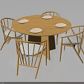 Modern Round Dining Table With Four Chairs And Plates On Top 3d model