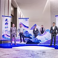 Group Photo Check-in Spot With Suited Men Blue Platform Mountain Backdrop 2024 TIRT DAYA Banners