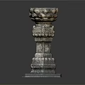 Intricately Carved Stone Pillar With Lotus Shaped Top And Square Base
