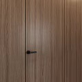 Modern Wooden Hinged Doors With Various Wood Grain Colors And Black Handles