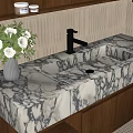 Elegant Marble Sink with Black Faucet White Flowers and Vertical Striped Tile Background