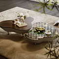 Modern Wooden And Marble Coffee Tables With Green Apples Cup Book Flowers On Soft Rug