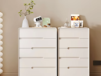 White Modern Dressers With Potted Plant Alarm Clock Photo Frame And Books 3d model