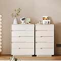White Modern Dressers With Potted Plant Alarm Clock Photo Frame And Books
